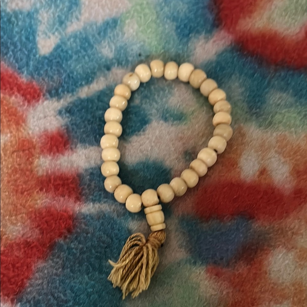 Bead bracelet with tail.
